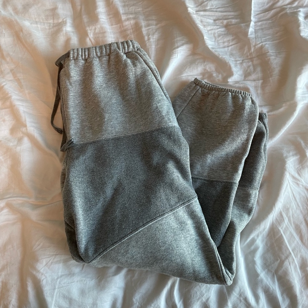 patched grey sweats